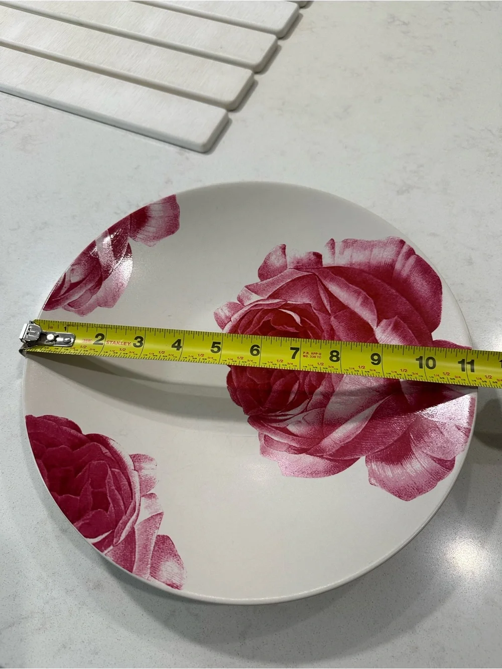 Gibson plate with pink rose motif, 11 inches x 2 inches tall